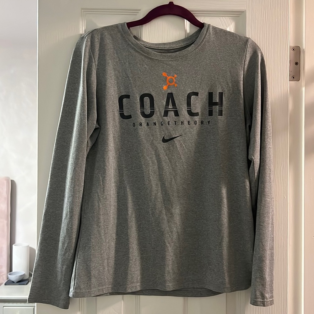 Long sleeve Nike orange theory coach top
